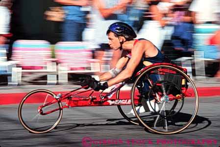 Stock Photo #4443: keywords -  action athlete blur challenge challenged disability disabled disadvantage disadvantaged dynamic handicap handicapped horz impair impaired man motion move movement need needs race racer released special sport wheelchair
