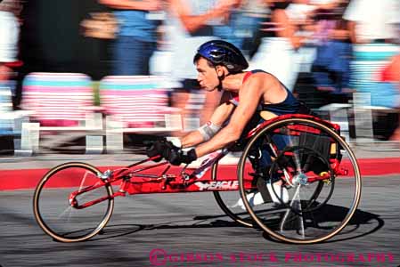 Stock Photo #4443: keywords - action athlete blur challenge challenged disability disabled disadvantage disadvantaged dynamic handicap handicapped horz impair impaired man motion move movement need needs race racer released special sport wheelchair