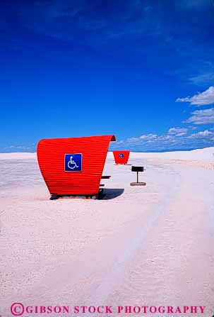 Stock Photo #4449: keywords -  challenge challenged disability disabled disadvantage disadvantaged handicap handicapped impair impaired mexico need needs new orange picnic reserved sands shade shelter special vert wheelchair white