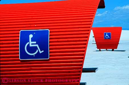 Stock Photo #4450: keywords -  challenge challenged disability disabled disadvantage disadvantaged handicap handicapped horz impair impaired mexico need needs new orange picnic reserved sands shade shelter special wheelchair white