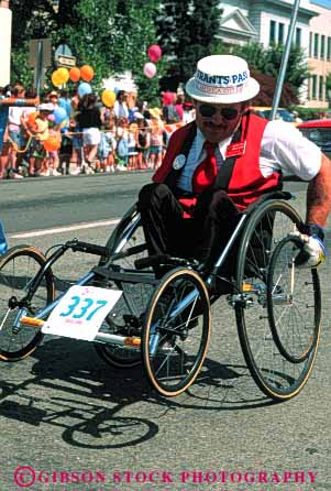 Stock Photo #4454: keywords -  challenge challenged disability disabled disadvantage disadvantaged handicap handicapped impair impaired man need needs race racer special sport vert wheelchair