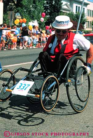 Stock Photo #4454: keywords - challenge challenged disability disabled disadvantage disadvantaged handicap handicapped impair impaired man need needs race racer special sport vert wheelchair