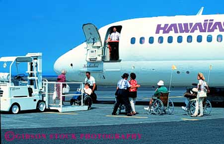 Stock Photo #4460: keywords -  access air challenge challenged disability disabled disadvantage disadvantaged fork handicap handicapped hawaii horz hydraulic impair impaired jet lift liner need needs plane special transportation wheelchair
