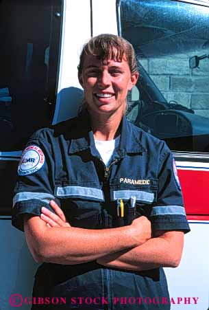 Stock Photo #4464: keywords -  aid ambulance career emergency emt female first income job medical medicine nurse occupation paramedic paramedics released rescue respond save smile technician treat treatment uniform vert vocation woman work worker