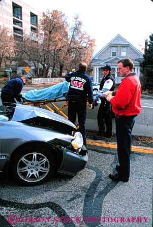 Stock Photo #4472: keywords -  accident adjuster aid ambulance auto automobile body car career collision damage emt first hurry hurt income injury insurance job medicine move nurse occupation paramedic paramedics records rescue respond rush save treat treatment vehicle vert victim vocation work worker