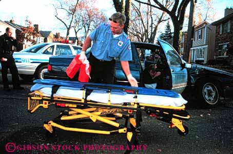 Stock Photo #4474: keywords -  accident aid ambulance auto automobile body car career collision damage emergency emt first horz hurry hurt income injury insurance job male man medical medicine move nurse occupation paramedic paramedics rescue respond rush save technician treat treatment vehicle vocation work worker