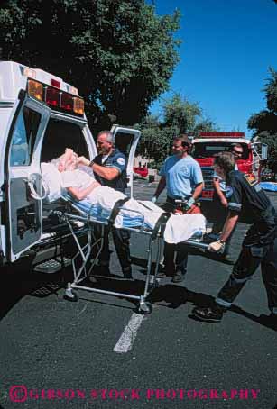 Stock Photo #4477: keywords -  aid ambulance body career damage elderly emergency emt first hurry income injury insurance job medical medicine move nurse occupation old paramedic paramedics rescue respond rush save senior sick technician treat treatment vehicle vert vocation woman work worker