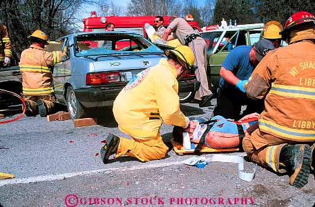 Stock Photo #11874: keywords - accident accidents aid ambulance assist assistance assisting attend auto car collision collisions emergency employee employees fireman firemen first horz injured injury job jobs man medical medicine men paramedic paramedics public rescue rescuing respond responders response save service technician treat treating treatment uniform victim victims work workers working works wreck