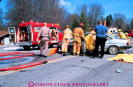 Stock Photo #11875: keywords -  accident accidents aid ambulance assist assistance assisting attend auto car collision collisions emergency employee employees fireman firemen first horz injured injury job jobs man medical medicine men paramedic paramedics police policeman policemen public rescue rescuing respond responders response save service technician treat treating treatment uniform victim victims work workers working works wreck