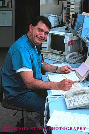 Stock Photo #4480: keywords - administration career coordinator desk health hospital job male man management medical medicine occupation paperwork released service staff supervisor unit vert vocation work worker working