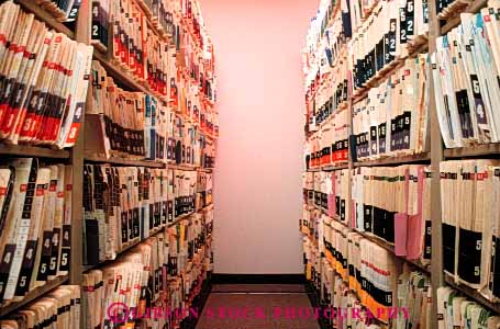 Stock Photo #4481: keywords -  data file files health horz hospital lots many medical medicine numerous organize overwhelming paperwork record records row rows service shelf shelves stacks staff