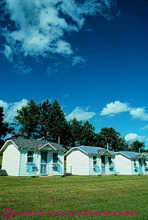 Stock Photo #4508: keywords -  all away beaten cabin cottage cottages country countryside get house hut identical little michigan motel off overnight path pattern quaint quiet remote repeat repetition romantic row rural same small tiny travel vacation vert white