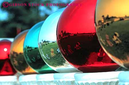 Stock Photo #4524: keywords -  balls circle color colorful concentric curve decorate decoration decorative glass green horz landscape pattern reflect reflection round row serial shape shiny sphere