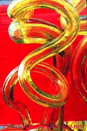 Stock Photo #4529: keywords -  abstract art artistic bend craft curve detail disorient disoriented glass green loop red round sculpture tube turn twist unique unusual vert wander wandering