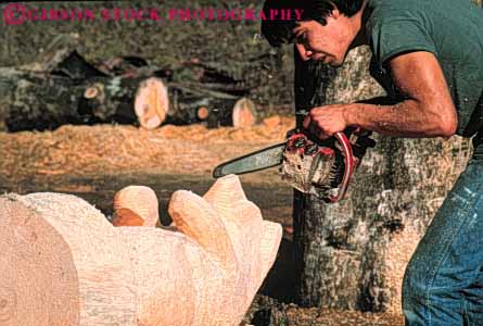 Stock Photo #4578: keywords -  art artistic bear carve carved carving caution chain craft create creative cut hobby horz job machine man power saw sculpture tool wood