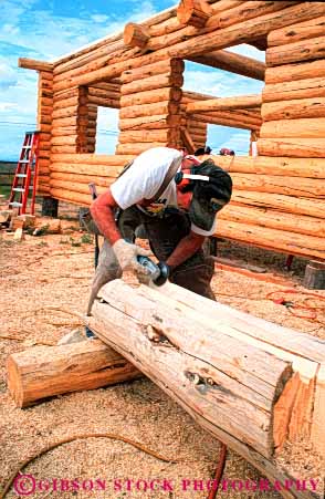 Stock Photo #4599: keywords -  build builder building carpenter construction craft home job log parallel power saw structure tool tradition traditional tree vert wood work