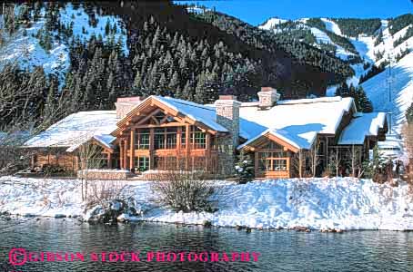 Stock Photo #4601: keywords -  building construction horz log parallel resort snow structure sun tradition traditional tree valley winter wood