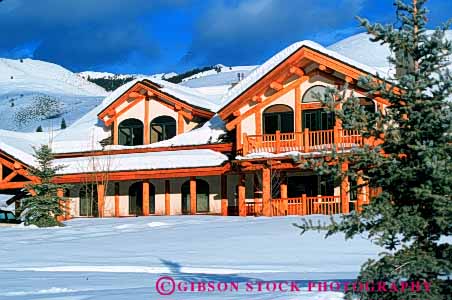 Stock Photo #4602: keywords -  building construction home horz house log parallel snow structure sun tradition traditional tree valley winter wood