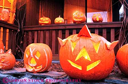 Stock Photo #4640: keywords -  angle autumn candle carve carved face fall geometric geometry halloween harvest holiday home horz house jack lantern lanterns light o orange outdoor outside porch pumpkin pumpkins round season silhouette triangle