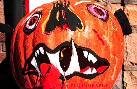 Stock Photo #4641: keywords - art artistic autumn create creative face fall halloween harvest holiday horz jack lantern o orange outdoor outside paint painted pumpkin round scary season teeth