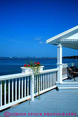 Stock Photo #4653: keywords -  architecture building coast exterior haven new ocean outdoor outside paint porch sea shore sun sunny sunshine vert view water white