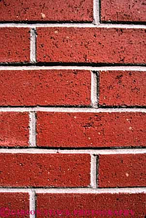 Stock Photo #4661: keywords -  alternate alternating angle art artistic brick brickwork construction craft craftsmanship decorate decorated decorative grid line masonry parallel pattern perpendicular rectangle rectangles red right stone texture vert wall