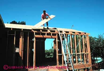Stock Photo #4675: keywords - add addition alone build builder building construct construction frame home horz house improvement ladder male man new one owner plywood project released residence residential roof room solitary solitude wood