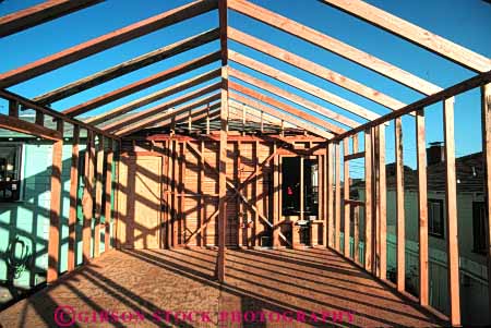 Stock Photo #4677: keywords -  add addition build builder building ceiling construct construction frame framing home horz house improvement new owner project rafter released residence residential roof room wall wood
