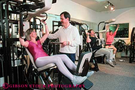 Stock Photo #4698: keywords - being body condition conditioning exercise group guide heal healing health healthy horz improve improvement injury learn machine medical medicine patient patients physical professional recover recovering recovery released session sports teach therapist therapy trained treat treating treatment well