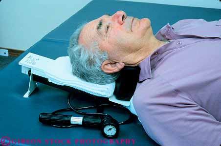 Stock Photo #14848: keywords - aged body cervical client clients condition conditioning conditions devise elderly equipment exercise exercising head heads heal healing heals health hold holding holds horz in man mature medical old older patient patients people person physical recover recovers recovery released senior seniors therapeutic therapy traction treat treating treatment treatments treats unit workout