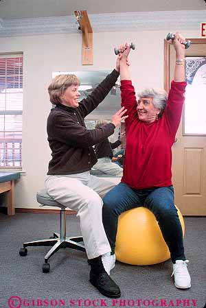 Stock Photo #14850: keywords -  arm arms assist assisting assists body care career caregiver cares caring client clients condition conditioning conditions elder elderly exercise exercising guidance guide guiding hand heal healing heals health help helper helpers helping helps hold holding holds job jobs lift lifted lifting lifts mature medical old older patient patients people person physical profession professional recover recovers recovery released senior seniors strength strengthening therapeutic therapist therapy touch touches touching treat treating treatment treatments treats vert weights with woman work worker workers working workout works