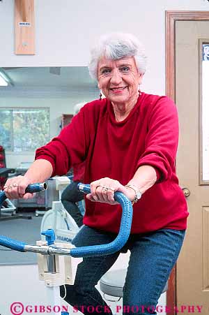 Stock Photo #14851: keywords -  body client clients condition conditioning conditions elderly exercise exercising exercycle heal healing heals health hold holding holds mature medical old older patient patients peddle peddles peddling people person physical recover recovers recovery released riding senior seniors therapeutic therapy treat treating treatment treatments treats vert woman workout