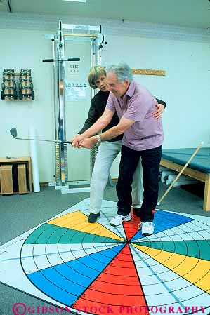 Stock Photo #14852: keywords -  assist assisting assists body care career caregiver cares caring client clients condition conditioning conditions elder elderly exercise exercising extremity flex flexes flexibility flexible grid guidance guide guiding heal healing heals health help helper helpers helping helps hold holding holds job jobs lower man mature medical old older patient patients pattern people person physical profession professional recover recovers recovery released senior seniors therapeutic therapist therapy touch touches touching treat treating treatment treatments treats vert work worker workers working workout works