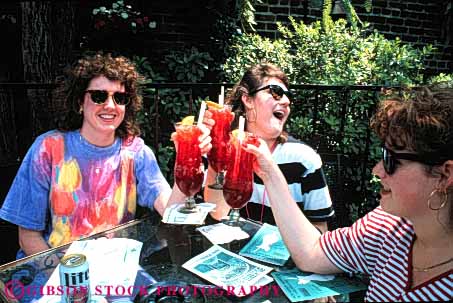 Stock Photo #4706: keywords -  alcohol beverage cafe dine dinner drink drinks eat eating food fun group horz hurricane laugh meal new oobriens orleans pat refreshment restaurant serve service share social three together tourist tourists travel traveler travelers vacation women