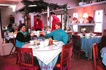 Stock Photo #4708: keywords - apres cafe couple dine dining dinner eat eating food group honeymoon horz husband man meal released restaurant serve service ski social vacation wife woman
