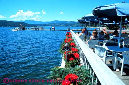 Stock Photo #4711: keywords - alene cafe coeur dine dining dinner do dock drink drinks eat eating food group horz idaho lake meal outdoor outside patio resort restaurant serve service social summer umbrella umbrellas vacation water