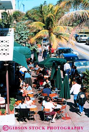 Stock Photo #4712: keywords -  beach cafe dine dinner eat eating food group meal miami news restaurant serve service sidewalk social vert