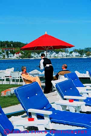 Stock Photo #4714: keywords -  cafe cocktail couple dine dining dinner drink drinks eat eating food group husband island mackinac meal michigan outdoor outside relax restaurant serve service social summer together umbrella vacation vert waiter wife