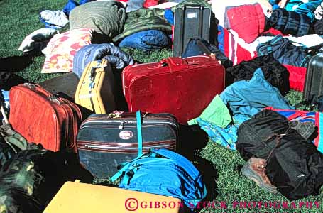 Stock Photo #4725: keywords -  bag clothes clothing contain container disorganized duffel horz lawn luggage overnight pile sleeping suitcase travel travelers vacation variety
