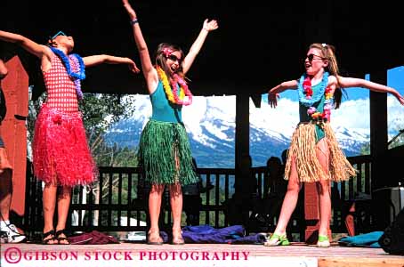 Stock Photo #4730: keywords - color colorful community coordinate coordinated costume dance dancers dancing display dress girl group horz move movement music musical old outdoor outside perform performance performers performing practice released routine show stage summer team ten three together year
