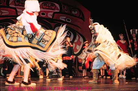 Stock Photo #4734: keywords -  alaska american chilkat color colorful coordinate coordinated costume dance dancers dancing display dress ethnic group haines horz indian minority move movement music musical native perform performance performers performing practice routine show stage team together traditional