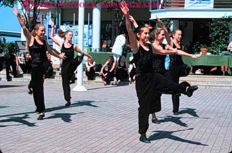 Stock Photo #4735: keywords -  adolescence adolescent color colorful coordinate coordinated costume dance dancers dancing display dress exercise fitness girls group horz jacksonville modern move movement music musical perform performance performers performing practice routine show stage team teenage teenagers together traditional