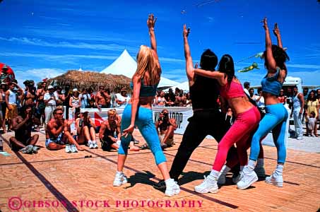 Stock Photo #4738: keywords -  aerobic beach color colorful coordinate coordinated costume dance dancers dancing display dress exercise fitness group horz miami move movement music musical outdoors outside perform performance performers performing practice routine show stage team together traditional