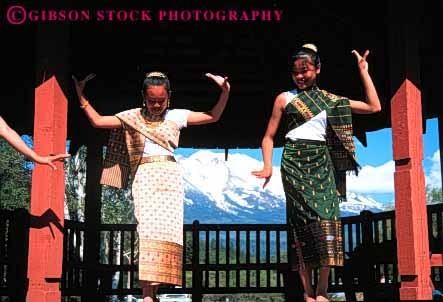 Stock Photo #4746: keywords -  color colorful coordinate coordinated costume culture dance dancers dancing display dress ethnic foreign group heritage horz laos laotian minority move movement music musical perform performance performers performing practice routine show stage team together traditional women