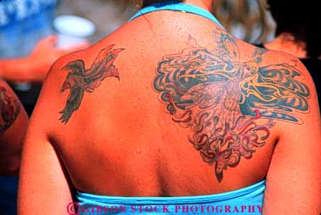 Stock Photo #4756: keywords -  art artful artistic body create creative decorate decorated decorative design dye embed embedded horz human ink pattern scar shoulder skin symbol tattoo tattooed tattoos unattractive woman