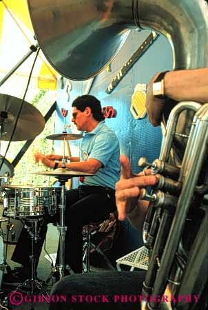 Stock Photo #4764: keywords - annual art artistic band coordinate coordinated coordinating dixieland drum drummer drumming drums event fair festival group harmonize harmony horn instrument instruments jazz jubilee music musical musician noise perform performance performers practice sacramento share show sound team together vert