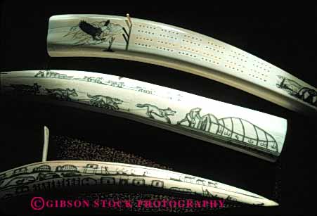 Stock Photo #4776: keywords -  alaska american art carve carved craft crafted craftsmanship create eskimo etch handmade horz indian ivory native nome product scrimshaw tooth tradition traditional tusk walrus
