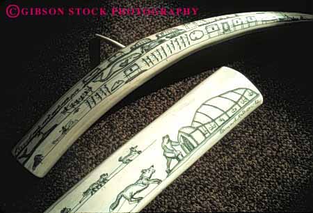 Stock Photo #4777: keywords - alaska american art carve carved craft crafted craftsmanship create eskimo etch handmade horz indian ivory native nome product scrimshaw tooth tradition traditional tusk walrus