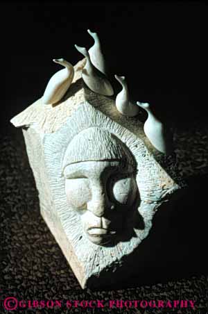 Stock Photo #4781: keywords - alaska american art carve carved craft crafted eskimo ethnic face handmade indian ivory native nome sculpture tradition traditional vert