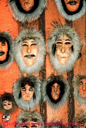 Stock Photo #4787: keywords -  alaska artificial ceremonial ceremony character cover craft display eskimo face fake handmade head hide identity masks merchandise nome obscure pretend retail sales sell tradition traditional up vert